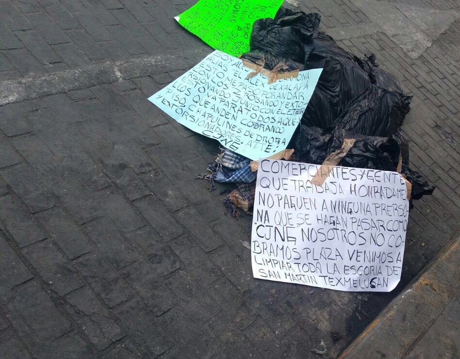 Dejan bolsas con narcomensajes en Texmelucan
