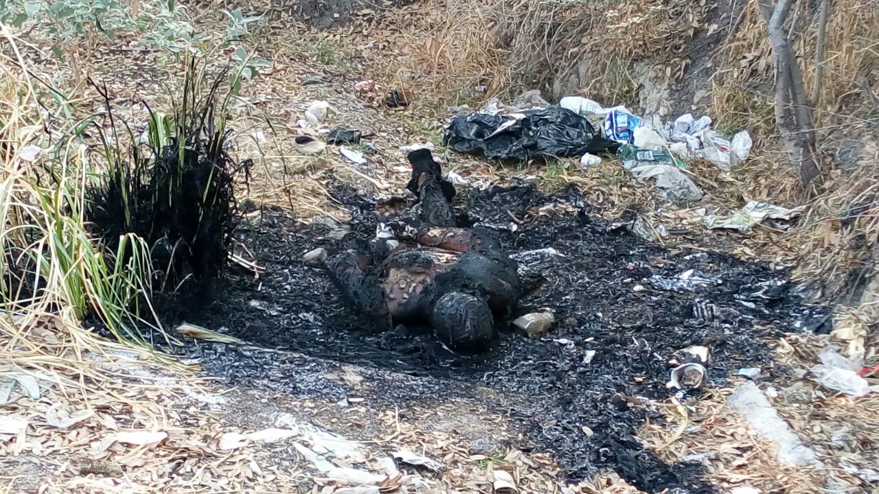 Hallan cadáver quemado y con manos atadas en Yauhquemehcan
