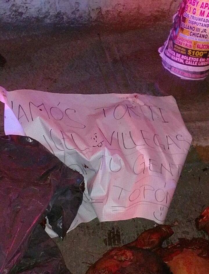 Tiran dos cuerpos desmembrados con narcomensaje