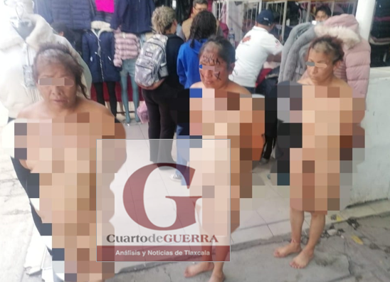 En tianguis de Texmelucan comerciantes rapan y desnundan a presuntas ladronas